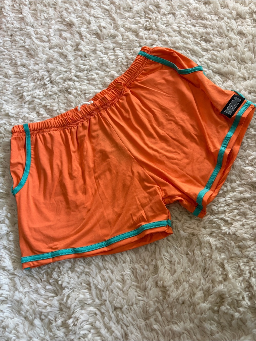 N2N Orange Athletic Shorts with Teal Trim -